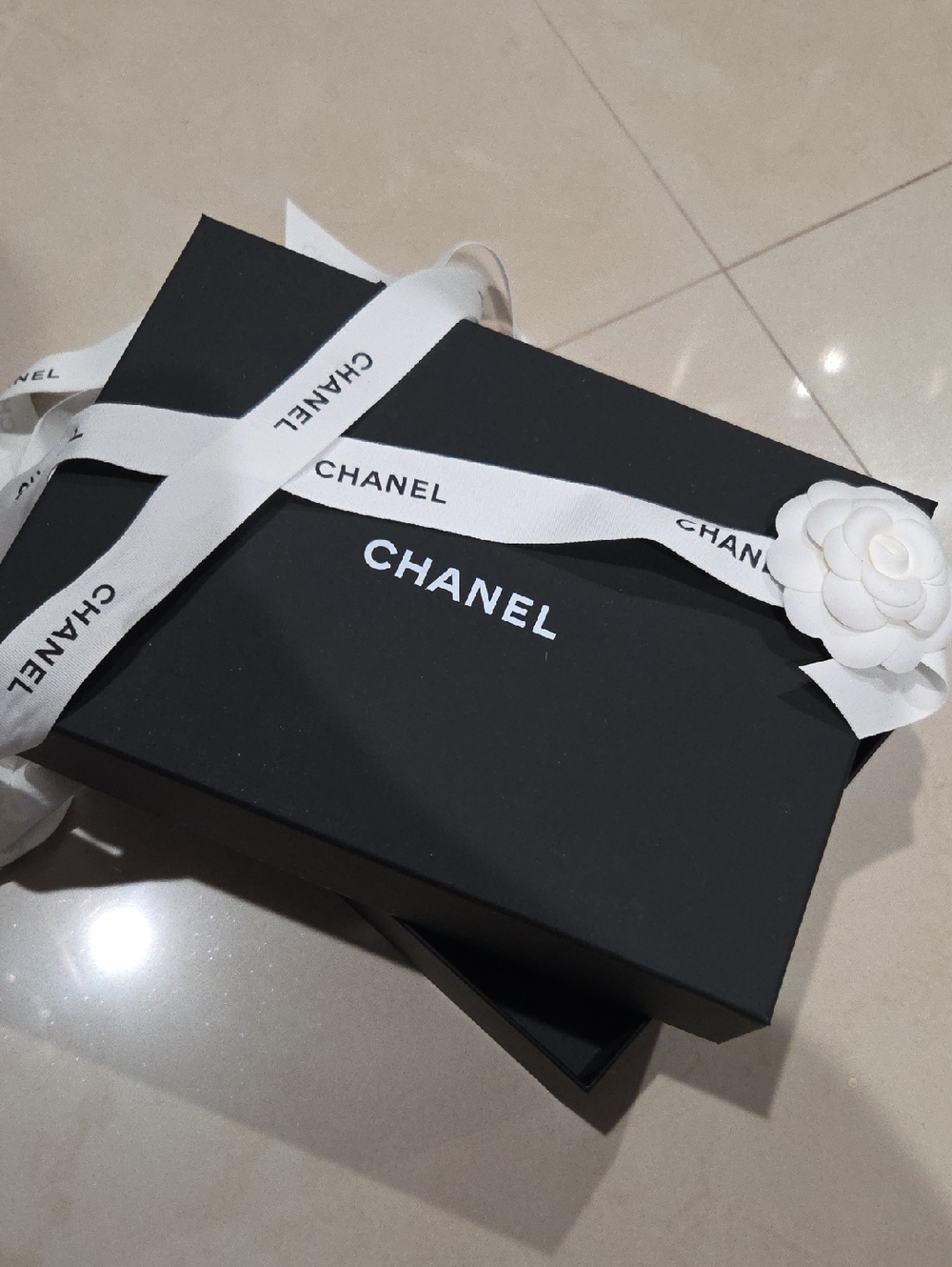 CHANEL Black Box with White Ribbon and Camellia